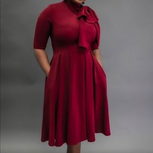 Classic pleated A line dress in burgundy
